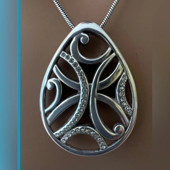 Brighton Teardrop Silver Tone Scrolls With Crystals Pendant  Brighton Teardrop Silver Tone Scrolls With Crystals Pendant Necklace. Retired.